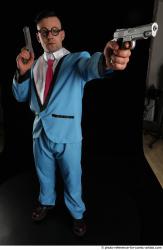 Man Adult Muscular White Fighting with gun Standing poses Business